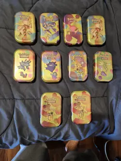 Pokemon 151 TCG Collectible Tin Box Set of 10 in display - Image 3
