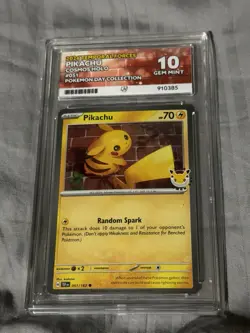 TEMPORAL FORCES PIKACHU COSMOS HOLO 051 POKEMON DAY COLLECTION Graded 10 - Image 1