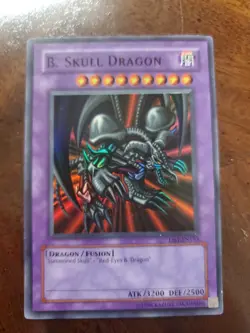 Yugioh B. Skull Dragon DB1-EN153 Super Rare Holo Unlimited - LP-NM - Image 1