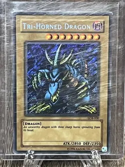 Tri-Horned Dragon – LOB-000 – Unlimited – Secret Rare – Yu-Gi-Oh! - Image 1