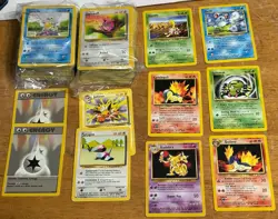 Opened Pokemon TCG Empoleon/Tyranitar Collectible Tin With 205 Random Cards - Image 1