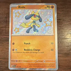 Pokemon Riolu 173/091 SV: Paldean Fates Shiny Rare Holo Basic Card - Image 1