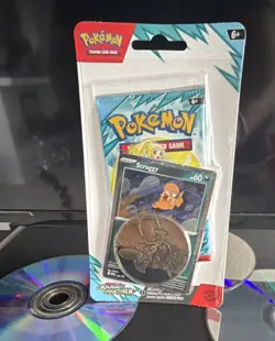 Pokemon TCG Journey Together Booster Pack Scraggy Promo Card & Coin - Image 1