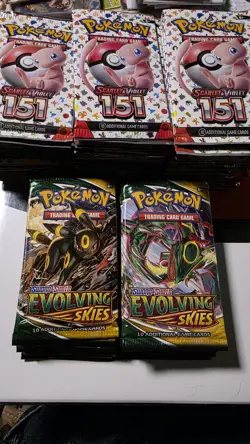 Pokemon TCG Booster Packs 151 & Evolving Skies already opened 73 packs total! - Image 1