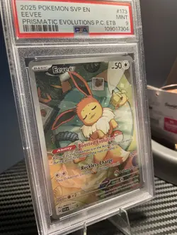 Eevee Pokemon Center Exclusive 2025 Pokemon Prismatic Evolutions PSA 9 #943 - Image 1