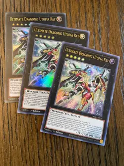 YUGIOH - ULTIMATE DRAGONIC UTOPIA RAY X3 - ULTRA RARE - 1ST ED - NM - LIOV - Image 1