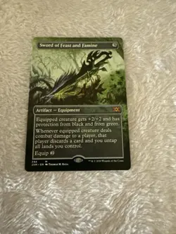 Sword of Feast and Famine (Borderless) Double Masters Regular - Image 1