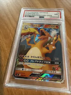 Charizard SML Sun & Moon Family Pokemon Card Game 009/051 PSA9 - Image 1