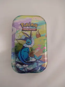 Pokemon TCG Scarlet And Violet Prismatic Evolutions Vaporeon Mini Tin Sealed New - Image 1