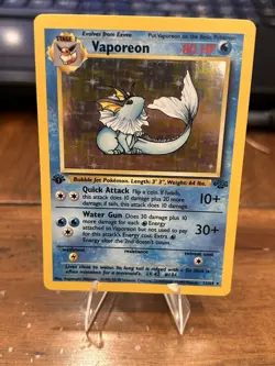 Pokemon Vaporeon 1st Edition Holo Rare Jungle 12/64 WoTC 1999 Raw - Image 1