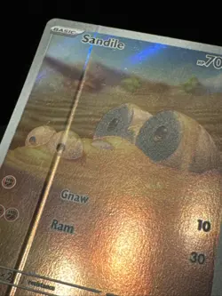 Sandile 216/198 SV01: Scarlet & Violet Base Set Holo, Error Card - Image 2