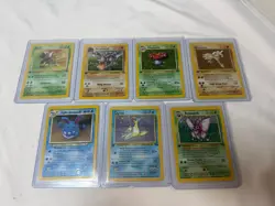 Pokemon Holo Lot of 7 Vintage Pokemon 1st edition MP/LP Lapras Hitmonlee - Image 1