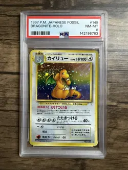 1997 POKEMON JAPANESE FOSSIL #149 DRAGONITE-HOLO PSA 8 - Image 1