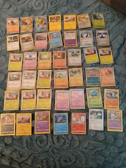 Pokemon Trading Card Mixed Lot of Approximately 50-60 cards & Other Related Item - Image 1
