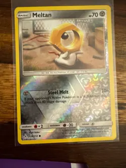 Meltan 128/214 Common Unbroken Bonds Pokemon Reverse Holo Near Mint - Image 1