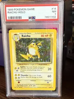 PSA 7 Pokemon Base Set Unlimited Holo Rare Raichu 14/102 NEAR MINT Condition! - Image 1
