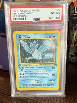 1999 POKEMON FOSSIL 1ST EDITION #2 ARTICUNO-HOLO PSA 8 - Image 1