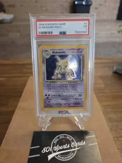 1999 Pokemon Game Alakazam Holo Rare 1/102 PSA 1 Vintage Pokemon - Image 1