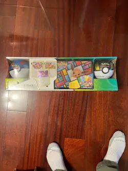 Pokemon Eevee Evolutions 3-Pack Treasure Chest Tin & 2 PokeBalls - Costco - Image 1