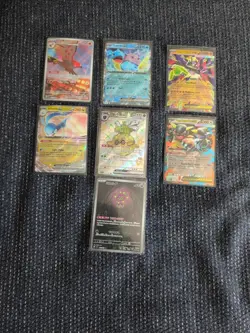 Lot Of 7 Pokemon Cards - Image 1