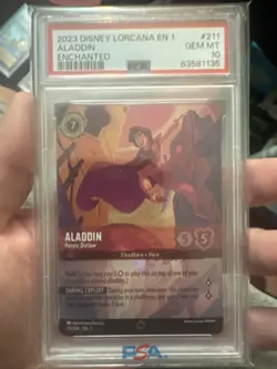 2023 DISNEY LORCANA THE FIRST CHAPTER ENCHANTED ALADDIN HEROIC OUTLAW PSA 10 - Image 1