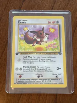 EEVEE 51/64 POKEMON CARD 1ST EDITION 1999 Near Mint- In Sleeve+ Top Loader - Image 1