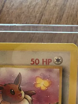 EEVEE 51/64 POKEMON CARD 1ST EDITION 1999 Near Mint- In Sleeve+ Top Loader - Image 3