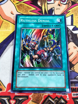 Ruthless Denial dp04-en024 Unltd Ed (NM) Super Rare Yu-Gi-Oh! - Image 1