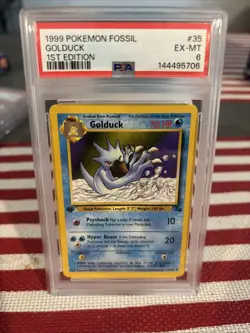 1999 POKEMON FOSSIL 1ST EDITION #35 GOLDUCK PSA 6 - Image 1