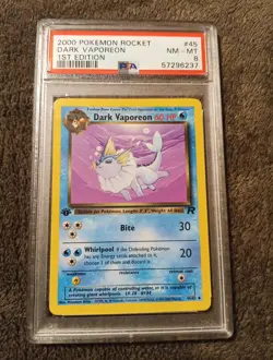 Pokemon 2000 Team Rocket Dark Vaporeon 1st Edition #45/82 PSA 8 English - Image 1
