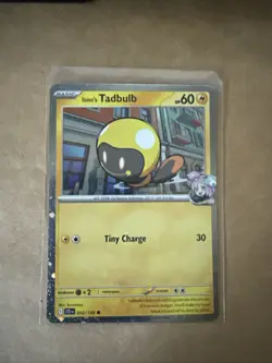 Pokemon Journey Together Iono's Tadbulb 052/159 (Cosmos Holo) - Image 1