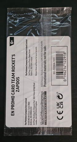 Team Rocket's Zapdos 70/182 - Pokemon Gamestop Stamped Promo - Sealed - Image 2