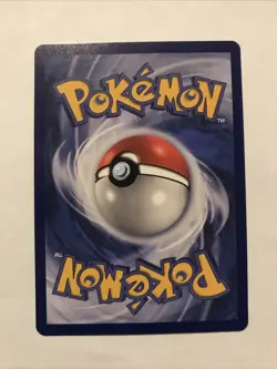 Team Rocket's Meowth Black Star Promo Pokemon Card #18 - Image 2