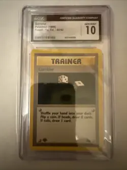 1999 POKEMON FOSSIL 1ST EDITION #60/62 GAMBLER CGC 10 GEM MINT - Image 1