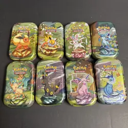 Pokemon Prismatic Evolutions Eeveelutions Mini Tin Full Set 8 Empty Coin Art - Image 1