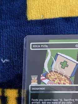 Ninja Pizza (Borderless) (Surge Foil) Commander: Teenage Mutant Ninja Turtles... - Image 2