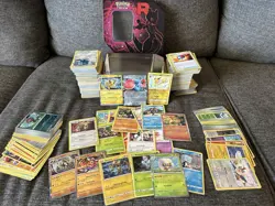 Pokemon Card Lot - 750 Authentic Pokemon Cards with 75 Holo/Rares + MewTwo Tin - Image 1