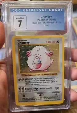 Pokemon Chansey Holo 3/102 from Base Set Shadowless in a CGC 7 - Image 1