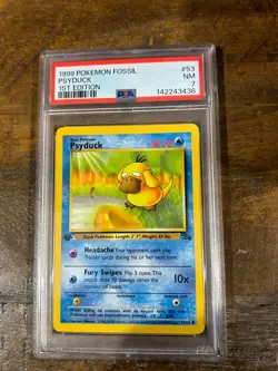 POKEMON 1999 Fossil PSYDUCK 1st Edition #53 PSA 7 RARE - Image 1