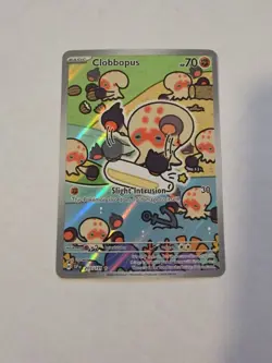 Clobbopus 207/191 Surging Sparks Illustration Rare Holo Pokemon NM - Image 1