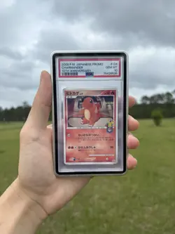 CHARMANDER 124/DP-P | PSA 10 | Pokemon 10th Anniversary | Yuka Morii - Image 1