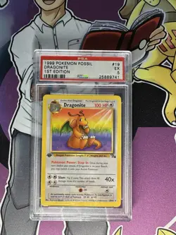 1999 POKEMON FOSSIL 1ST EDITION #19 DRAGONITE PSA 6 - Image 1