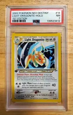 Pokemon PSA 7 NM 2002 Light Dragonite 1st Edition Neo Destiny Holo Card Swirl - Image 1