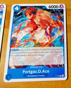 ONE PIECE CARD GAME PROMO CARTE ENGLISH PORTGAS D ACE P-103 EN JCC MINT - Image 1