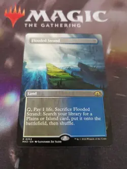 Mtg. Flooded Strand. Borderless. Modern Horizons 3. #353. Pack Fresh - Image 1