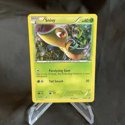 Pokemon Snivy BW06 Black & White Promo Holo - LP - Image 1