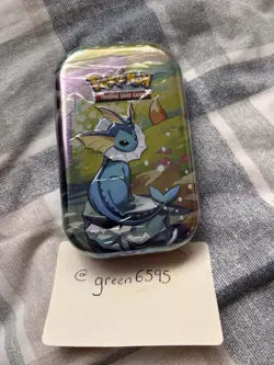 Pokemon TCG Prismatic Evolutions Tin – Factory Sealed – English – Brand New - Image 1