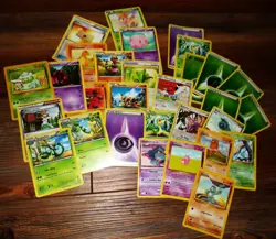 Pokemon Tin with assorted Pokemon Cards - Image 2