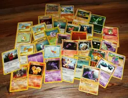 Pokemon Tin with assorted Pokemon Cards - Image 3