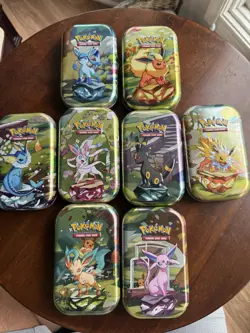 8 Empty Pokemon Prismatic Evolutions Mini Tins - Image 1